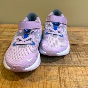 Nike renew run kids sz 12 shoes, never worn.  Light purple, blue and grey.